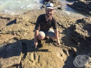 Matt with Dinosaur Footprints at Gantheaume Point, Broome in Western Australia.