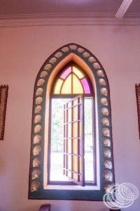 One of the peal decorated windows at the pearl shell church in Beagle Bay