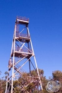 An old steel mining headframe behind the visitor information centre