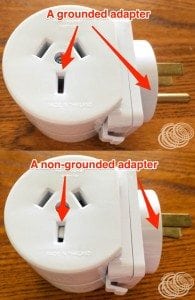 A grounded Australian adapter vs a non-grounded adapter