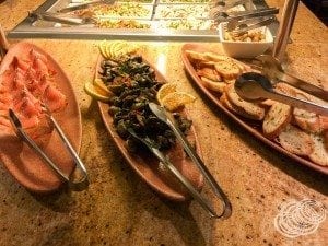 Left to right: Smoked salmon, Grilled mushroom with pesto salad, Garlic crostini