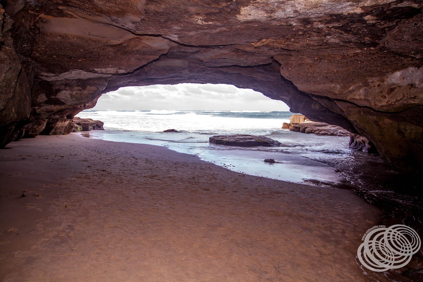 Looking out of the first cave at Caves Beach