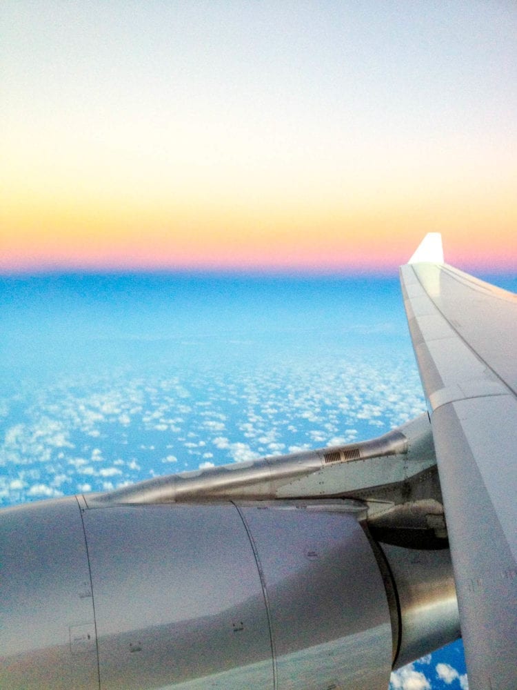 Sunrise From A Plane