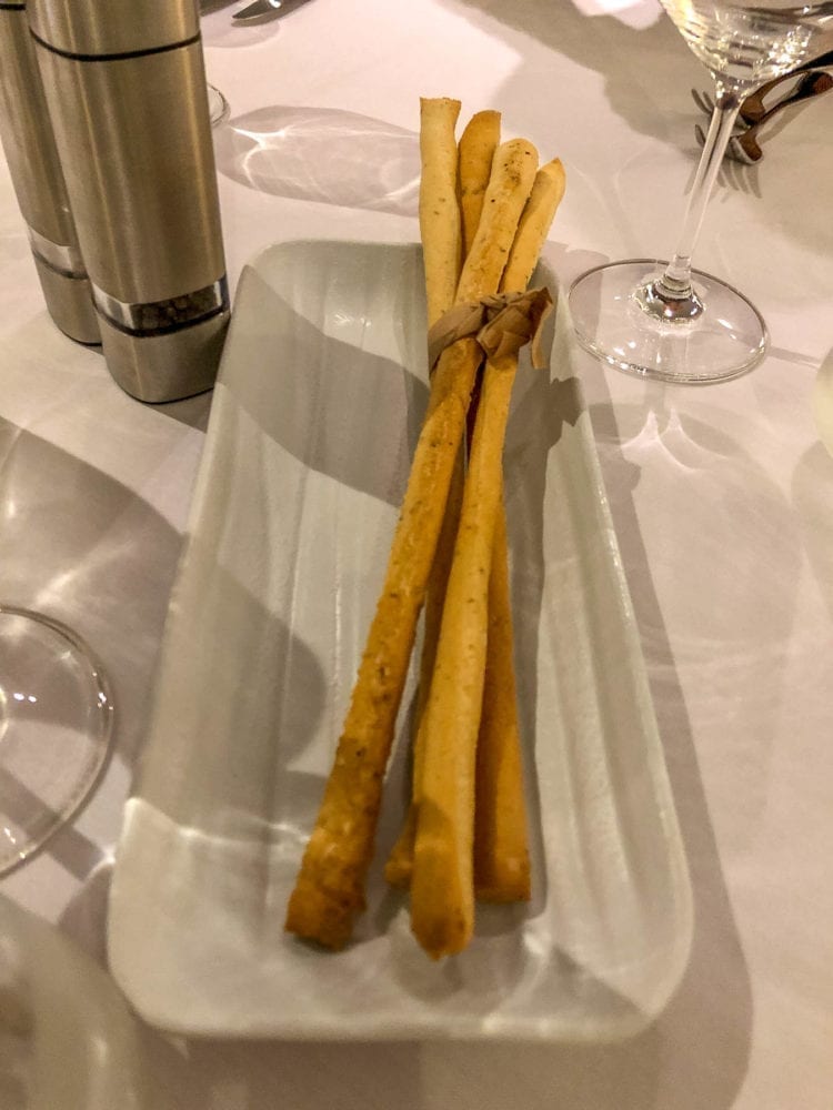 Bread sticks are provided at P&O's Angelo's restaurant while you wait for your food.
