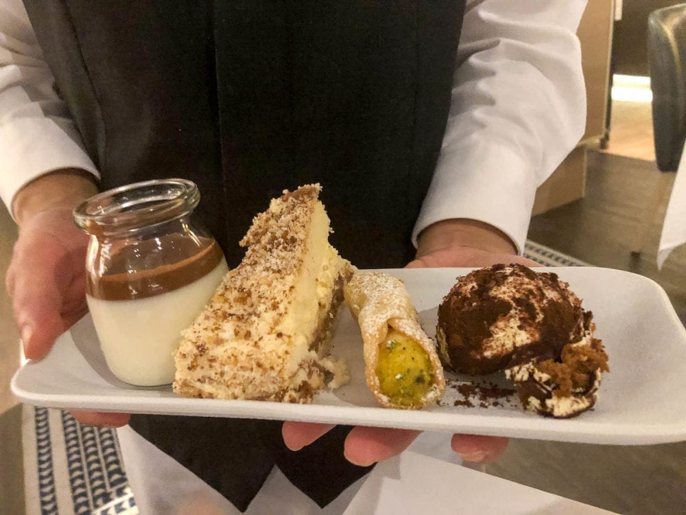 Angelo's Dessert Selection - Panna Cotta, Tiramisu, Pistachio Cannelloni, and a Custard Torte
