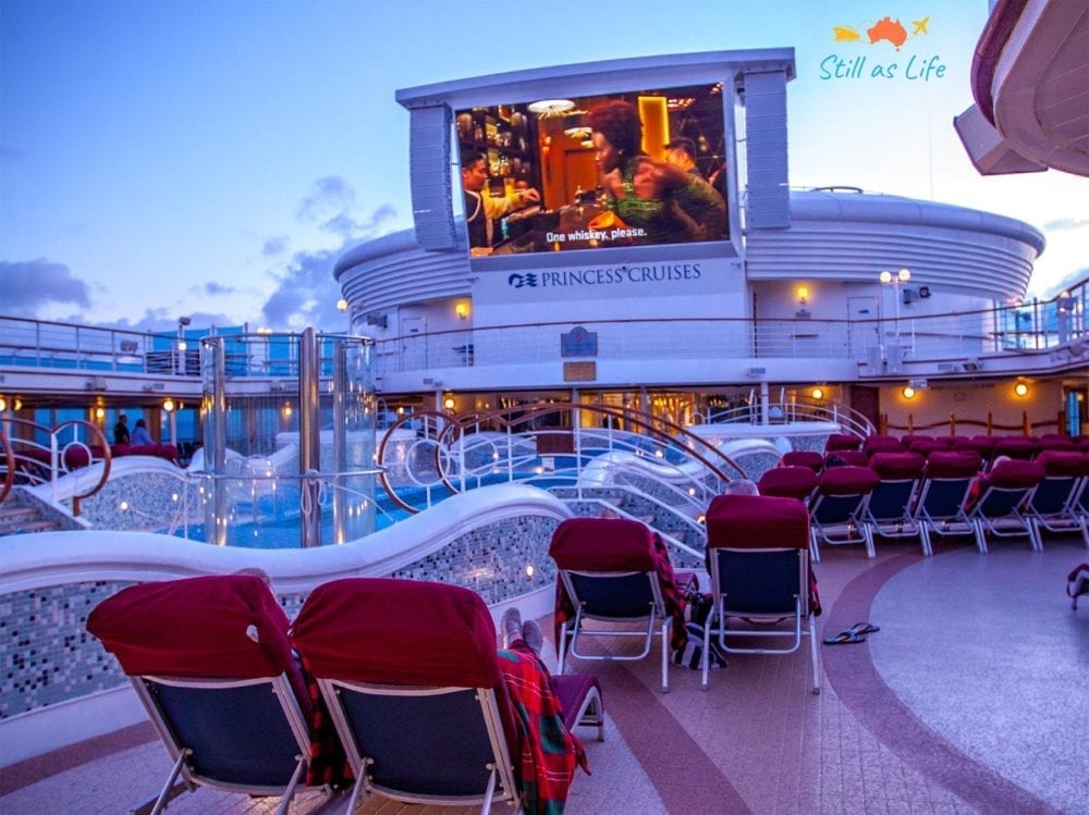 Watching an outdoor movie in the evening on Golden Princess