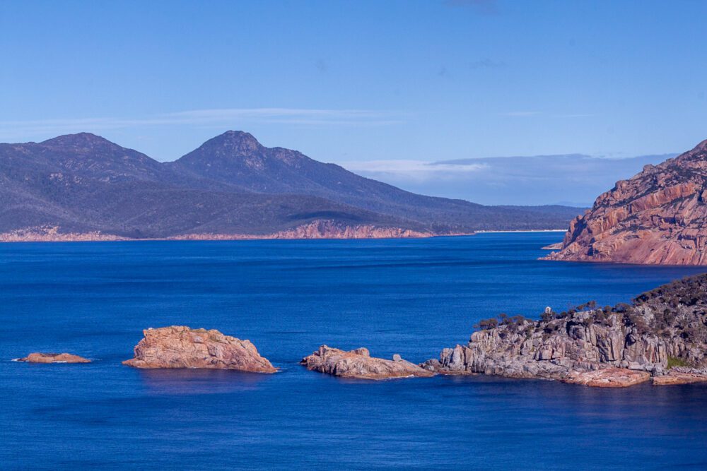 Looking south from Cape Tourville towards Wineglass Bay with Mt Graham and Mt Freycinet on the left.